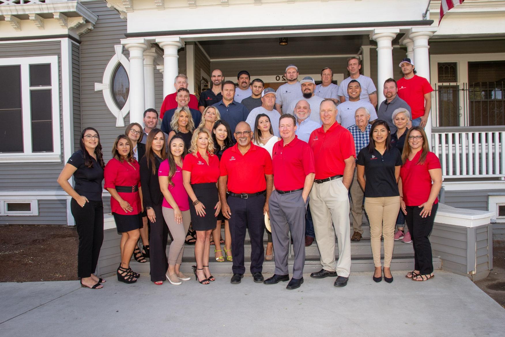 Company photo of all Equity Group Property Management team members infront of business